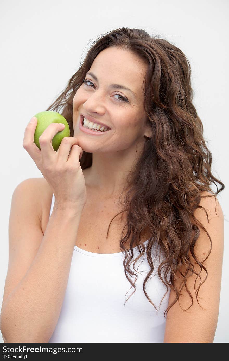 Closeup of woman eating a green apple. Closeup of woman eating a green apple