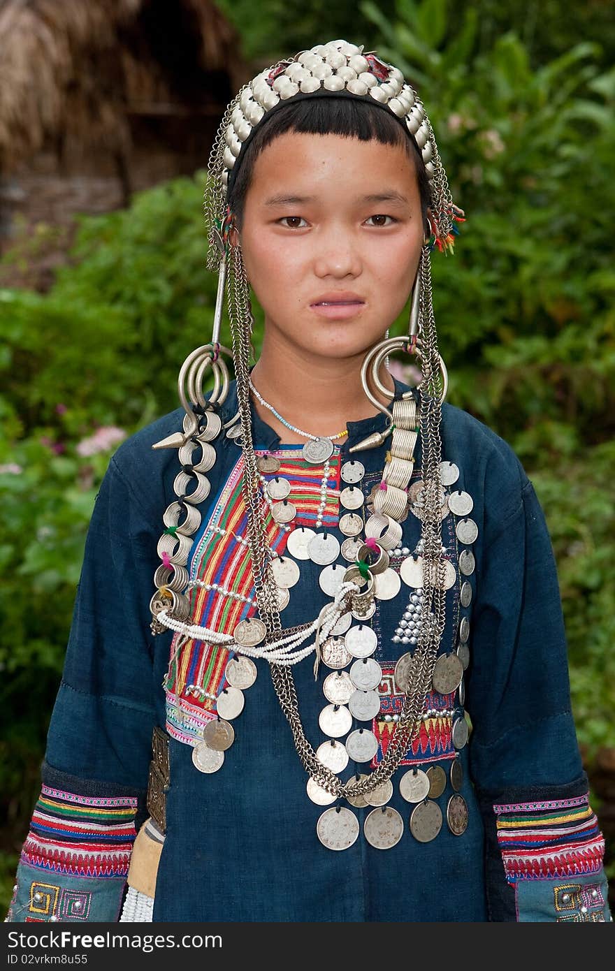 Portrait young Akha in Laos, woman with traditional clothes