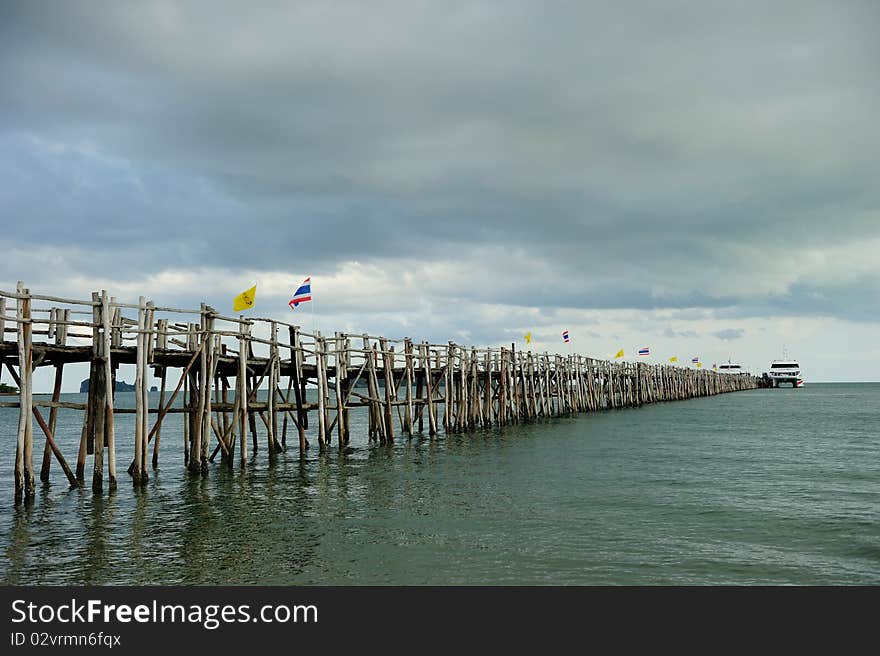 Wood bridge to the sea in South of Thailand