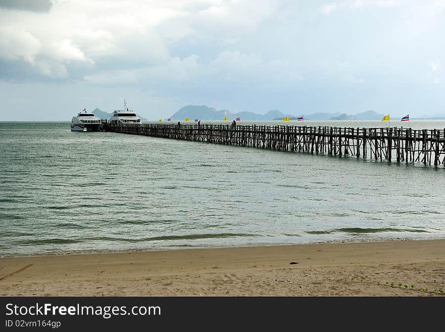 Wood bridge to the sea in South of Thailand