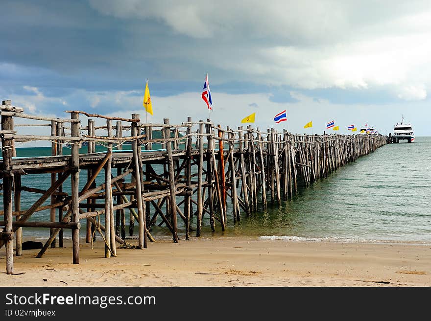 Wood bridge to the sea in South of Thailand