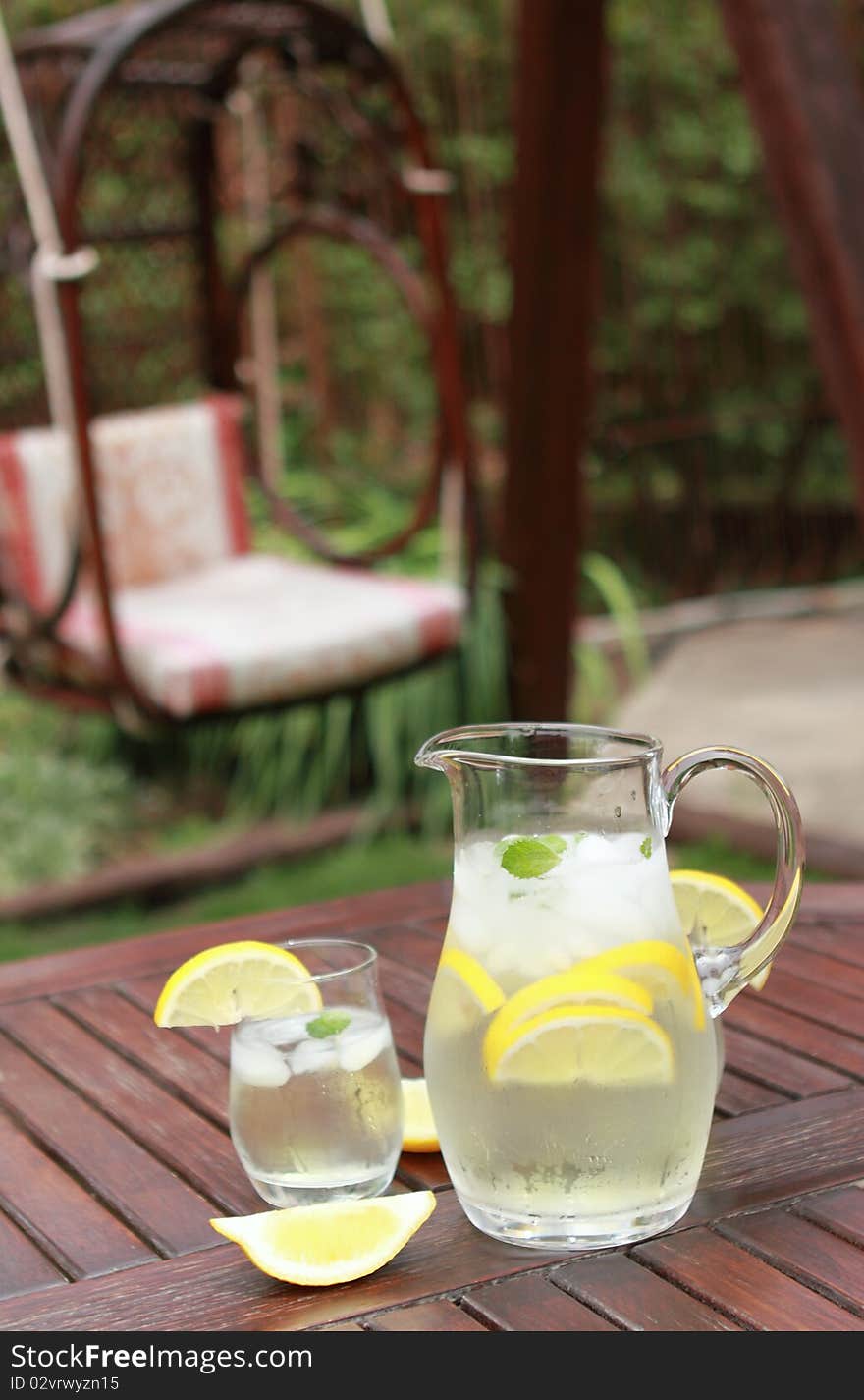 Pitcher and  glasses of fresh lemonade