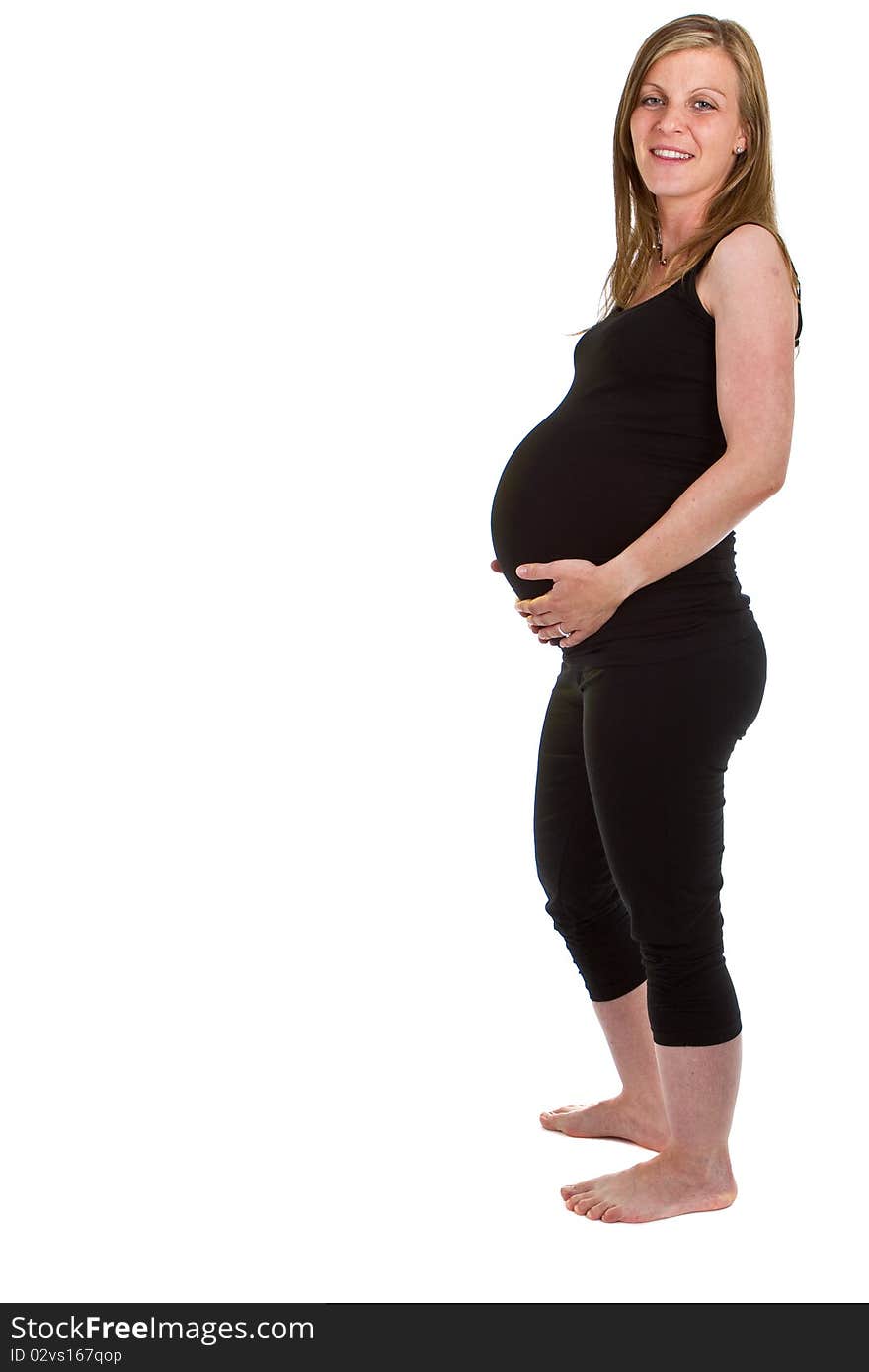 Young beautiful pregnant woman isolated over white background. Young beautiful pregnant woman isolated over white background.