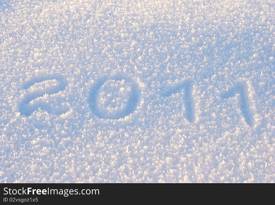 New year 2011 on natural snow background