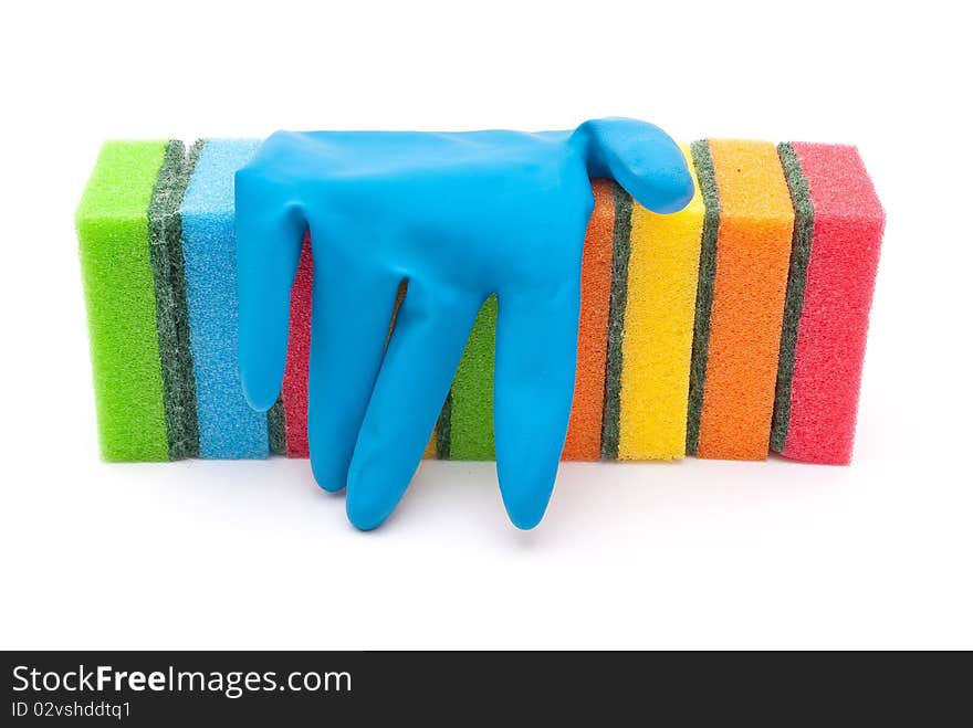 Rubber gloves and kitchen sponges on white