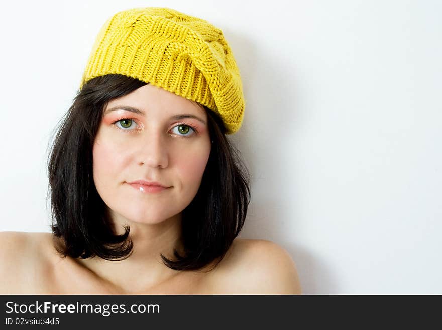 Close-up of a young woman with green eyes looking natural and relaxed. Close-up of a young woman with green eyes looking natural and relaxed