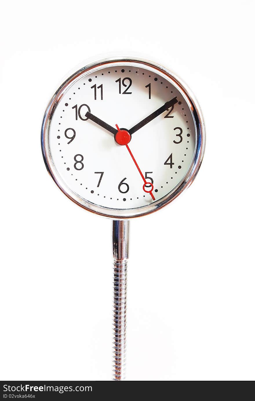 Modern table clock isolated on seamless white background