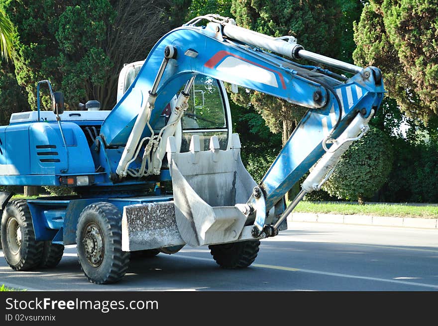 Large, blue excavator