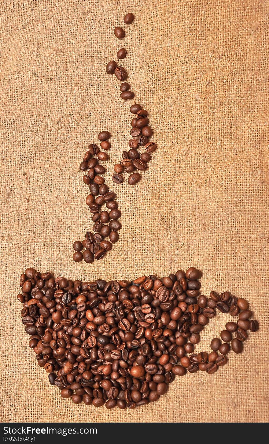 Coffee beans on textile background