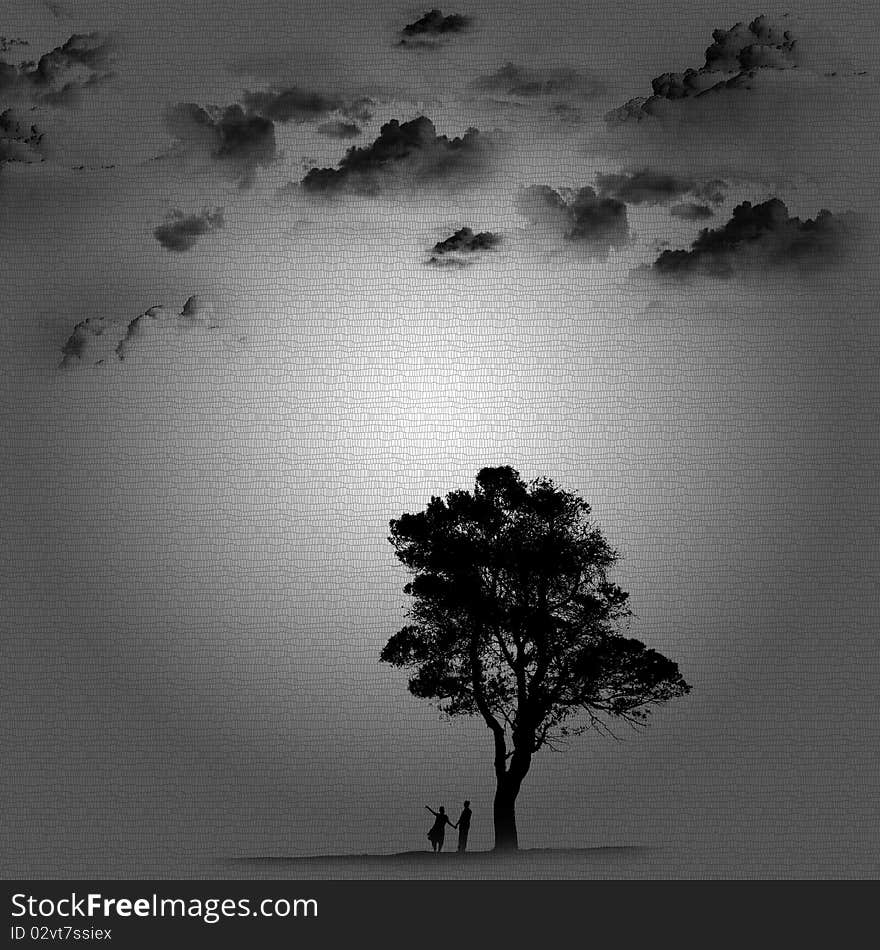 The young couple standing under a tree, above the clouds float by. The young couple standing under a tree, above the clouds float by