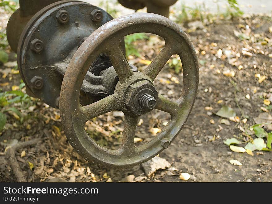 Old rusty valve in pipeline