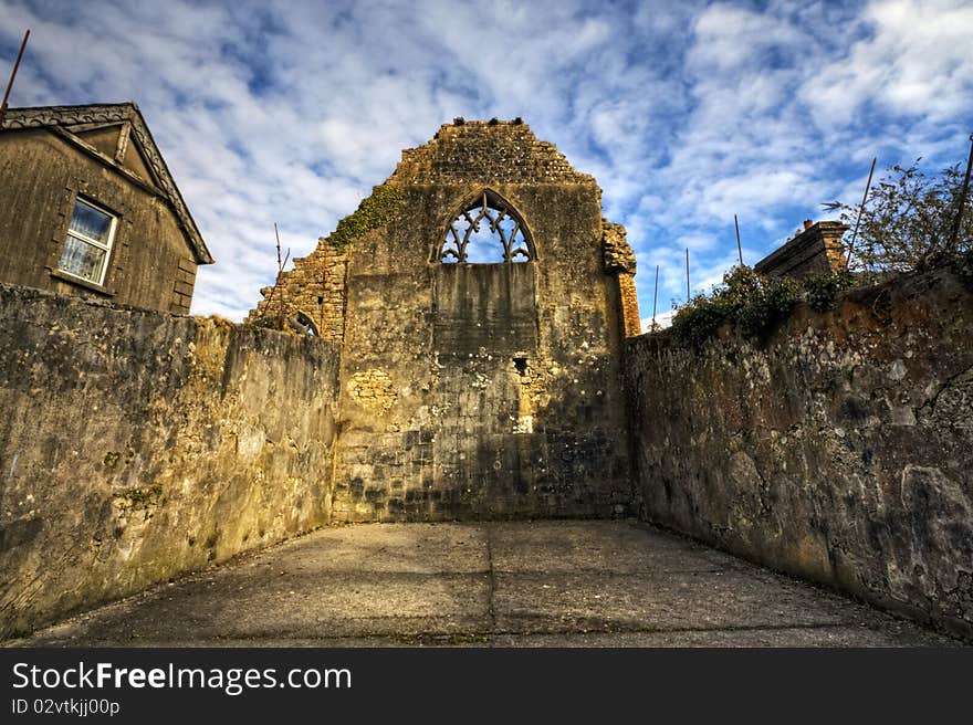 Athenry Dominican Friary Detail with arch window and walls, HDR image. Athenry Dominican Friary Detail with arch window and walls, HDR image