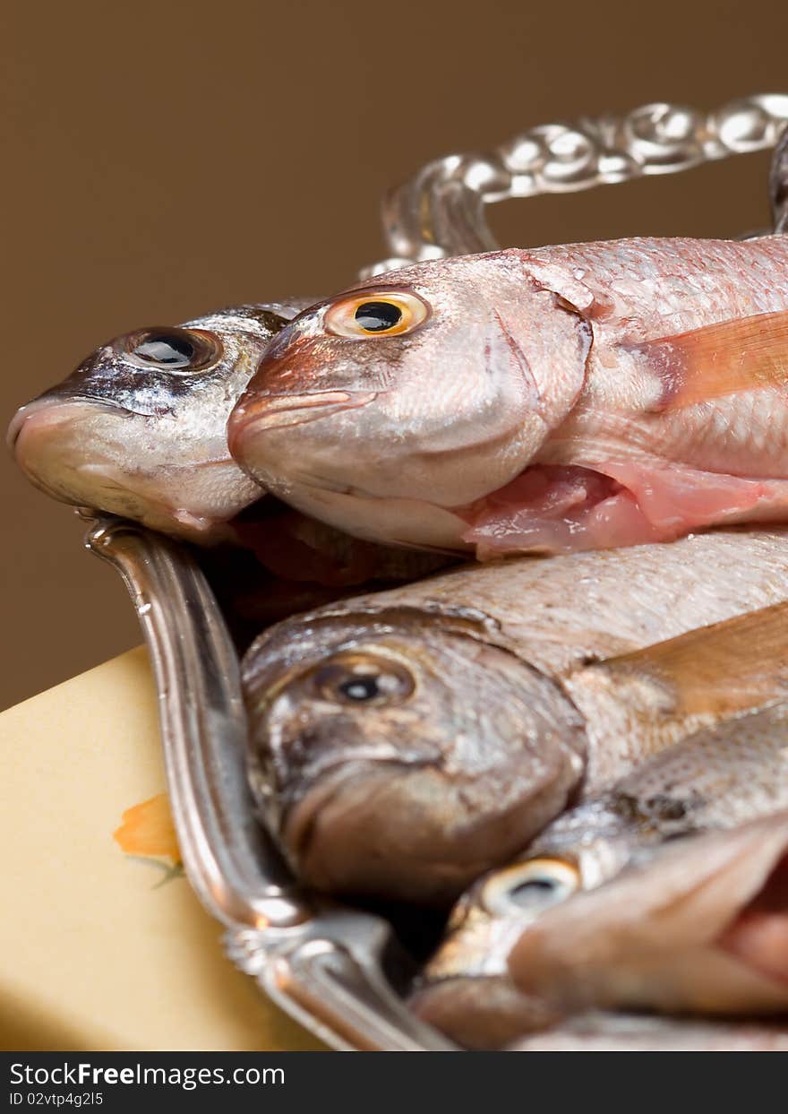 Cleaned fresh fish on the plate