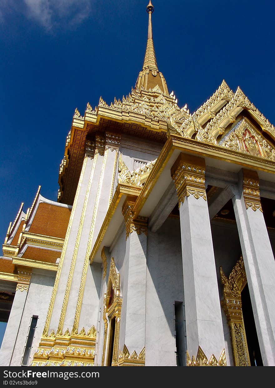 A marble temple representing the successful marriage between Italian Carrara marble and classical Thai architecture. A marble temple representing the successful marriage between Italian Carrara marble and classical Thai architecture.