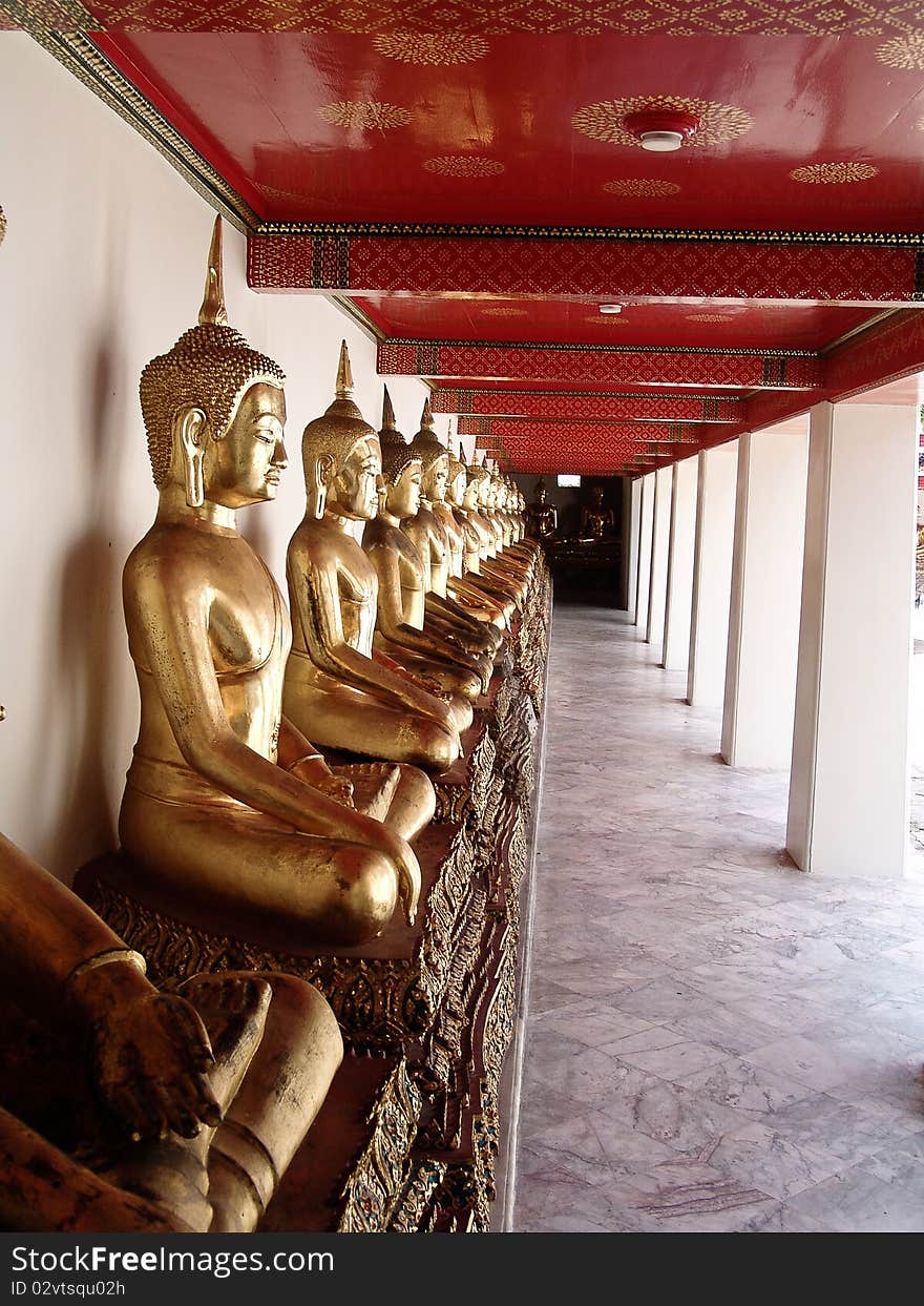 Buddha sitting in a row