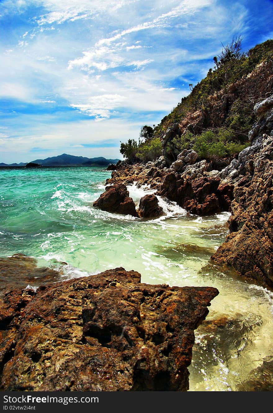 The sky, the rocks, the sand, and the water make malcapuya's shoreline such a wonder to behold. The sky, the rocks, the sand, and the water make malcapuya's shoreline such a wonder to behold.