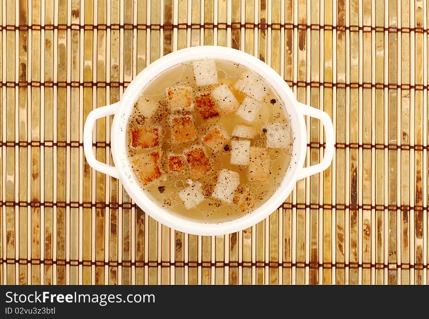 Chicken broth with crackers