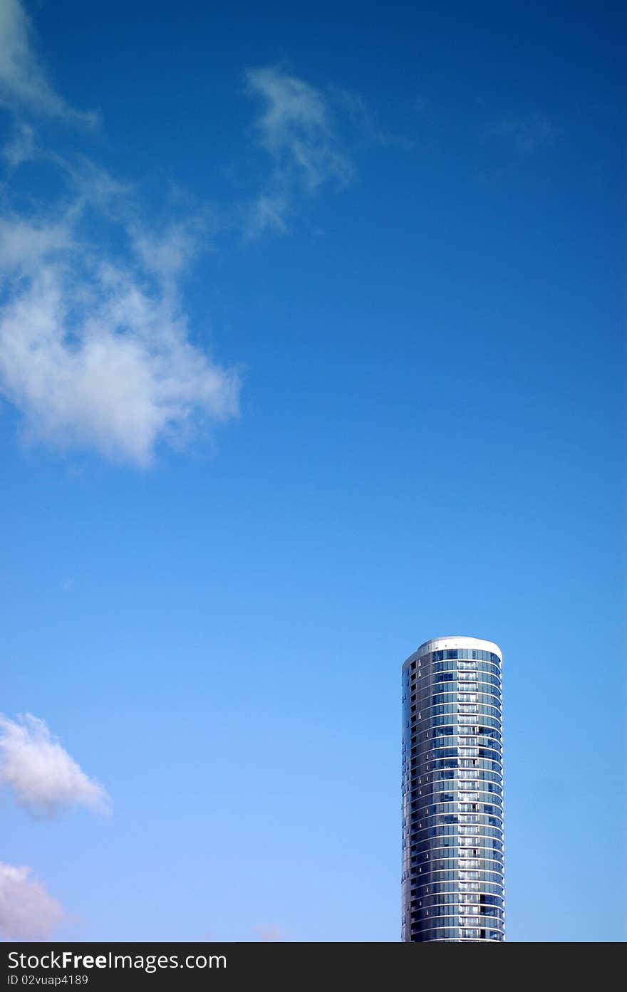 Architecture Image of Sleek Skyscraper Against Blue Sky With Copy Space. Architecture Image of Sleek Skyscraper Against Blue Sky With Copy Space