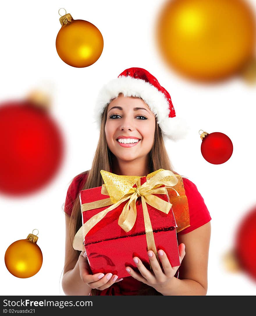 Young girl with a xmas gift and spheres