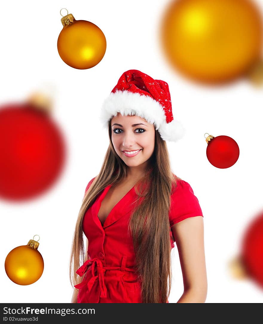 Attractive young women in santa claus hat on a spheres background