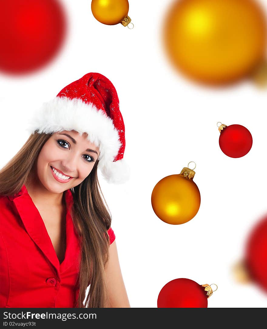 Young women in santa claus hat on a spheres background