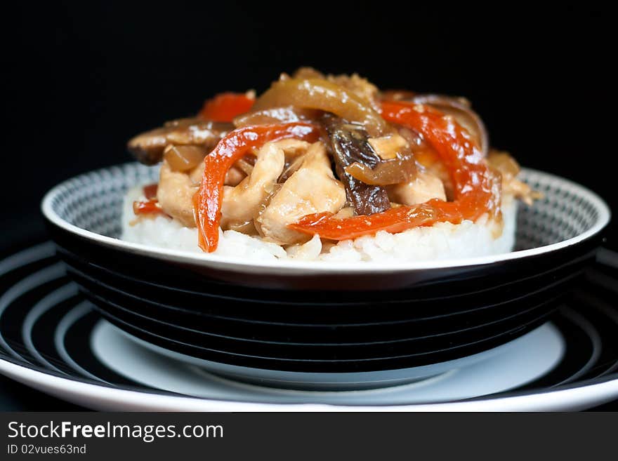 Asian rice topped with chicken