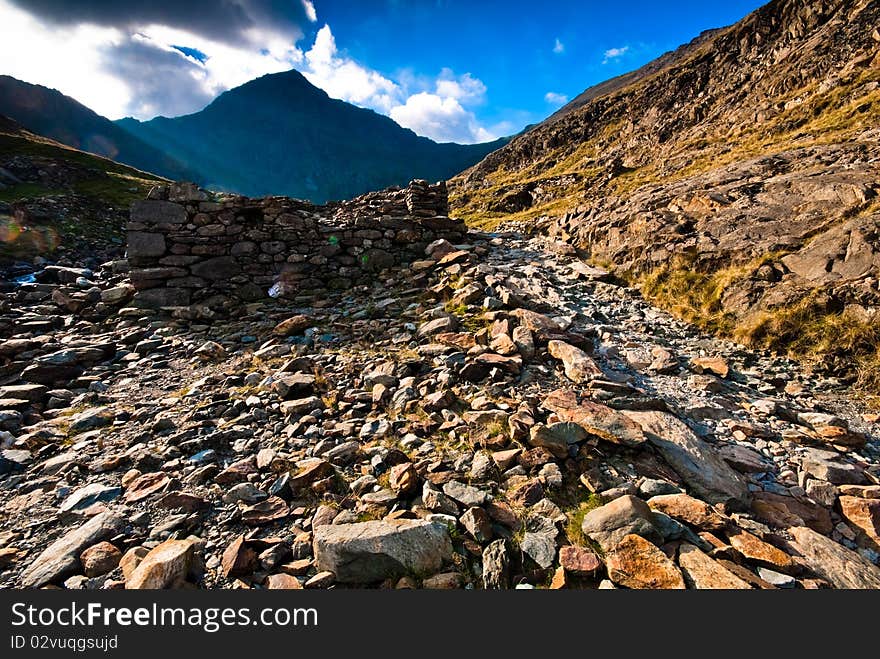 Rocky road and a beautiful mountain