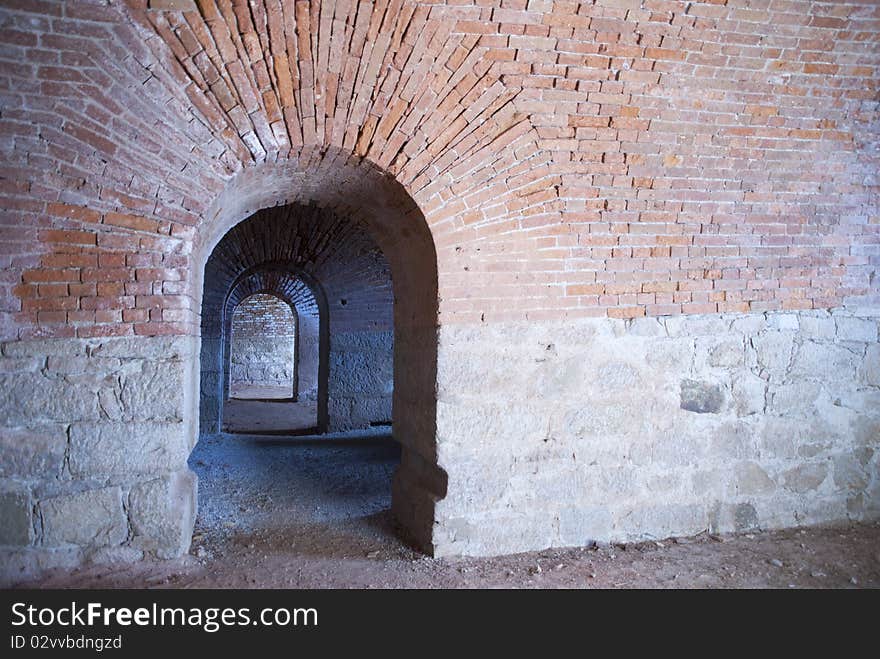 Corridor with bricks and stones