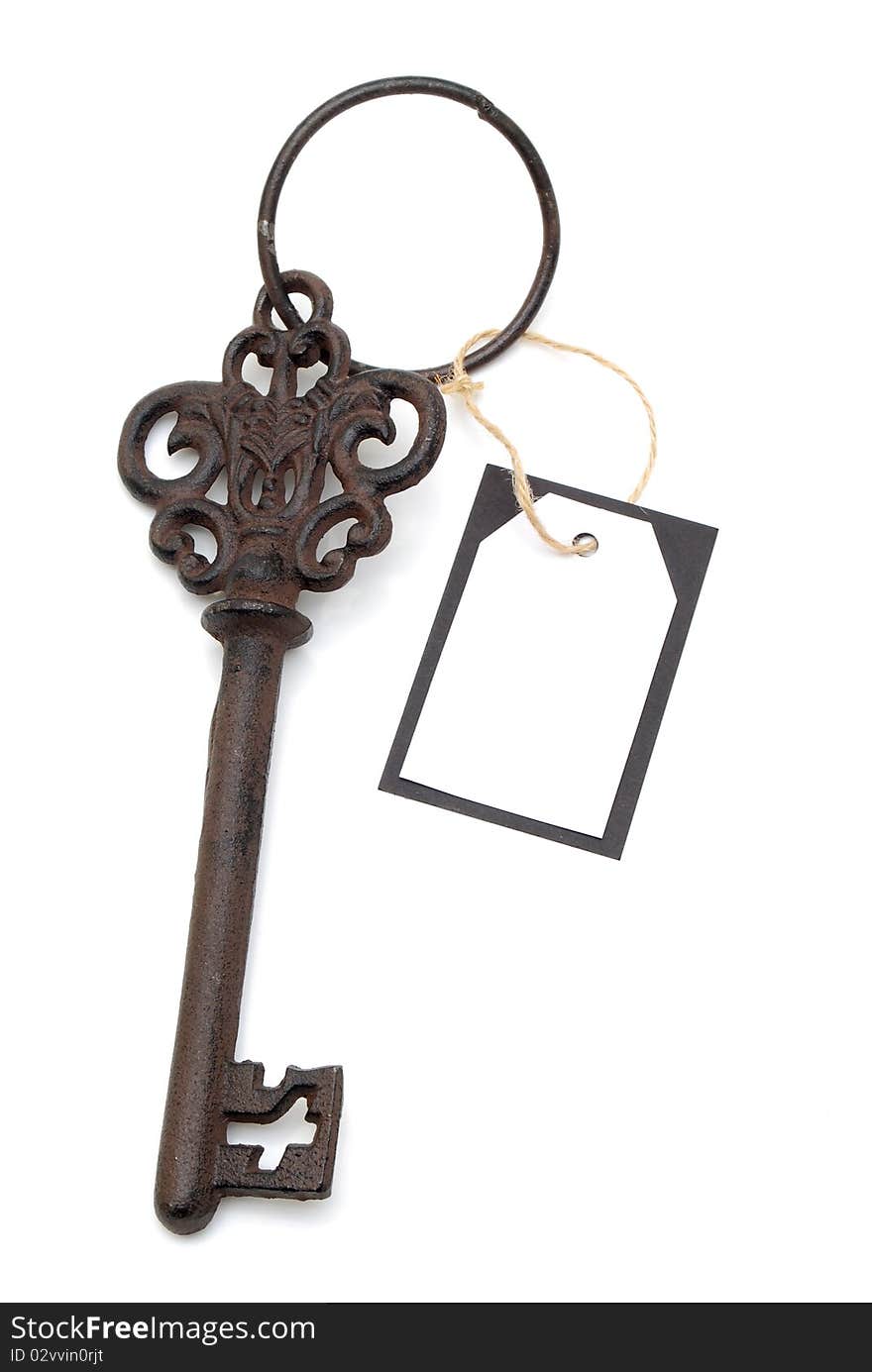 Antique key with blank card