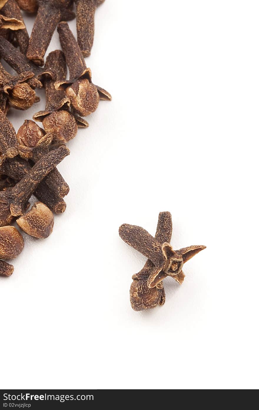 Spices for addition in food on a white background.