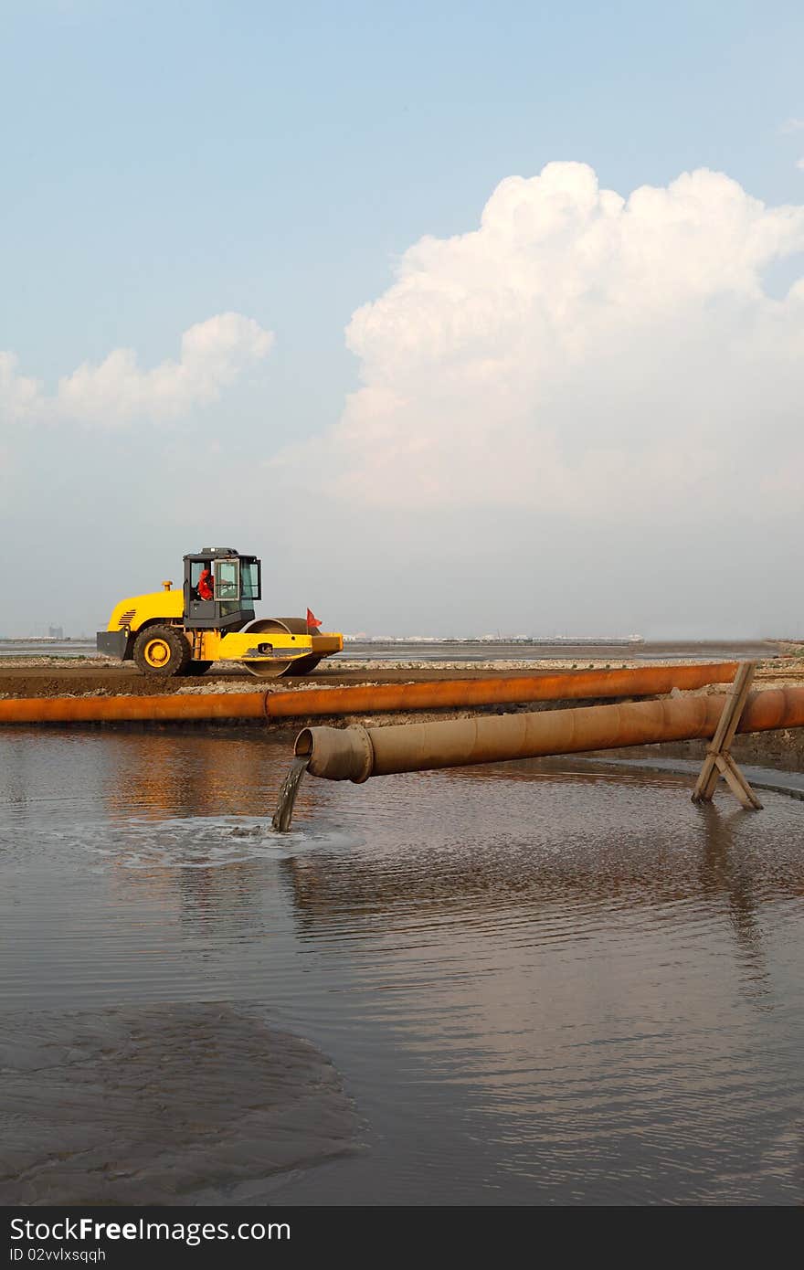 Bulldozer on a Beach Dredging work