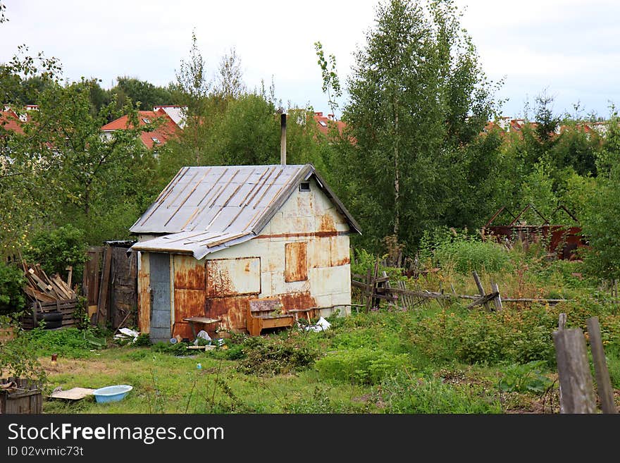 Small hut in a small garden. Small hut in a small garden