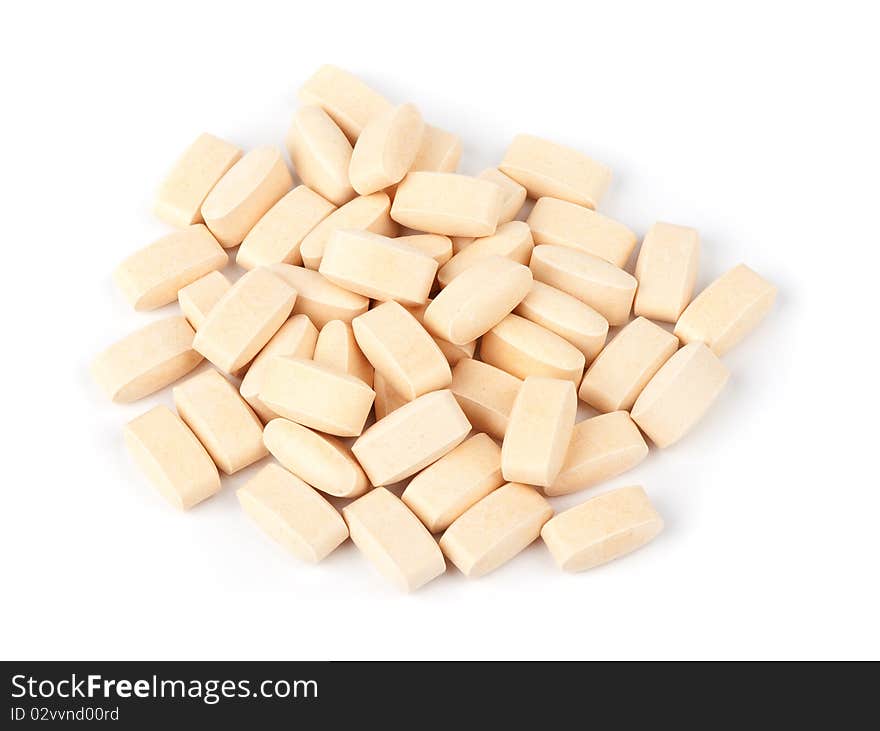 Heap of tablets isolated on a white