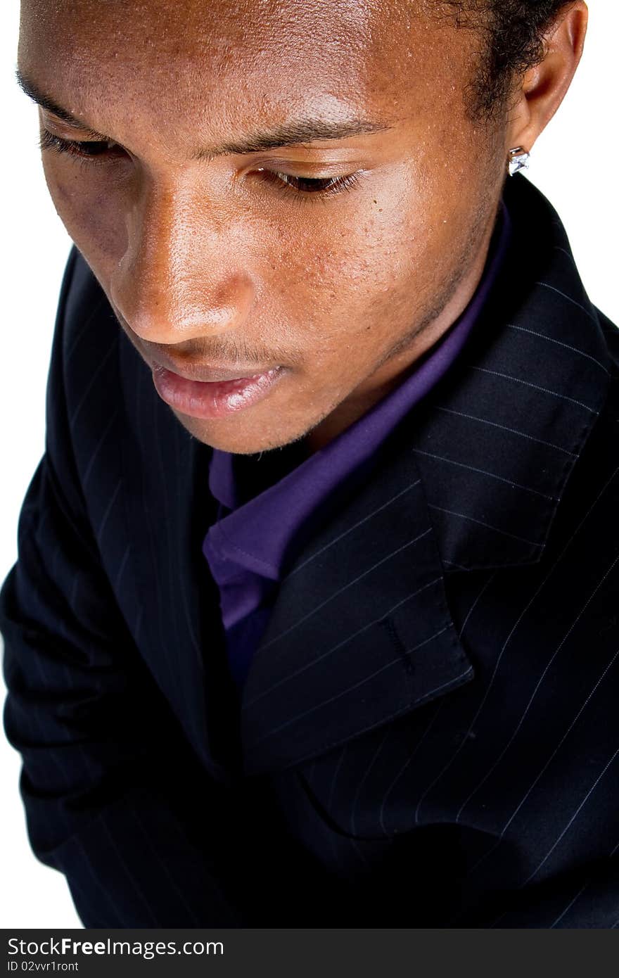 Young black businessman over white background. Isolated fresh teenager in suit.