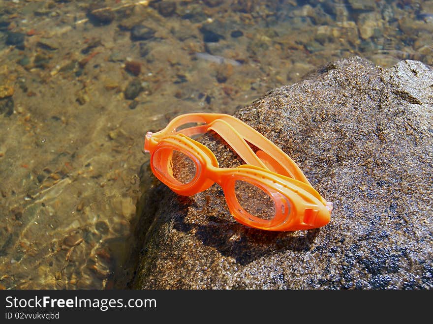 Glasses for swimming on a stone