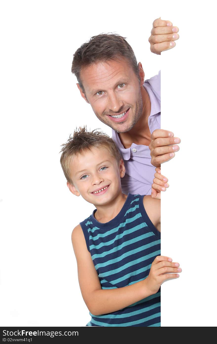 Closeup of man with little boy showing message. Closeup of man with little boy showing message