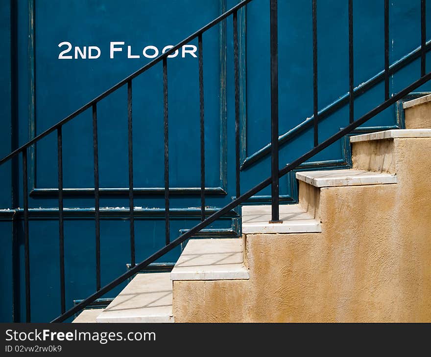 The stair up to second floor and blue wall