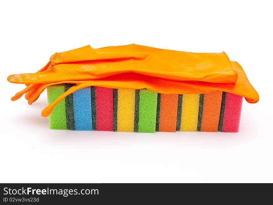 Rubber gloves and kitchen sponges on white