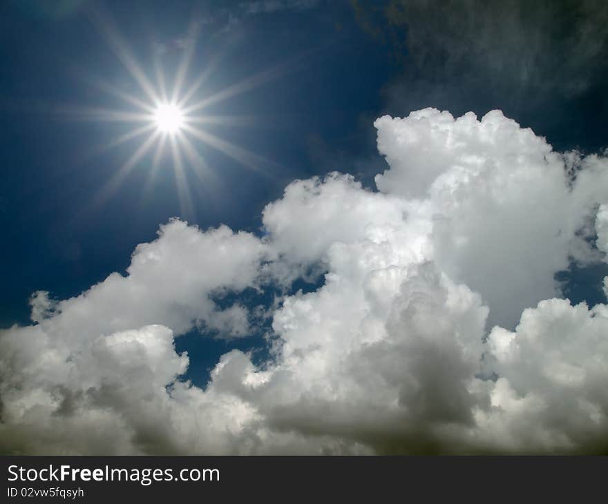 Sun shine in the blue sky an white cloud