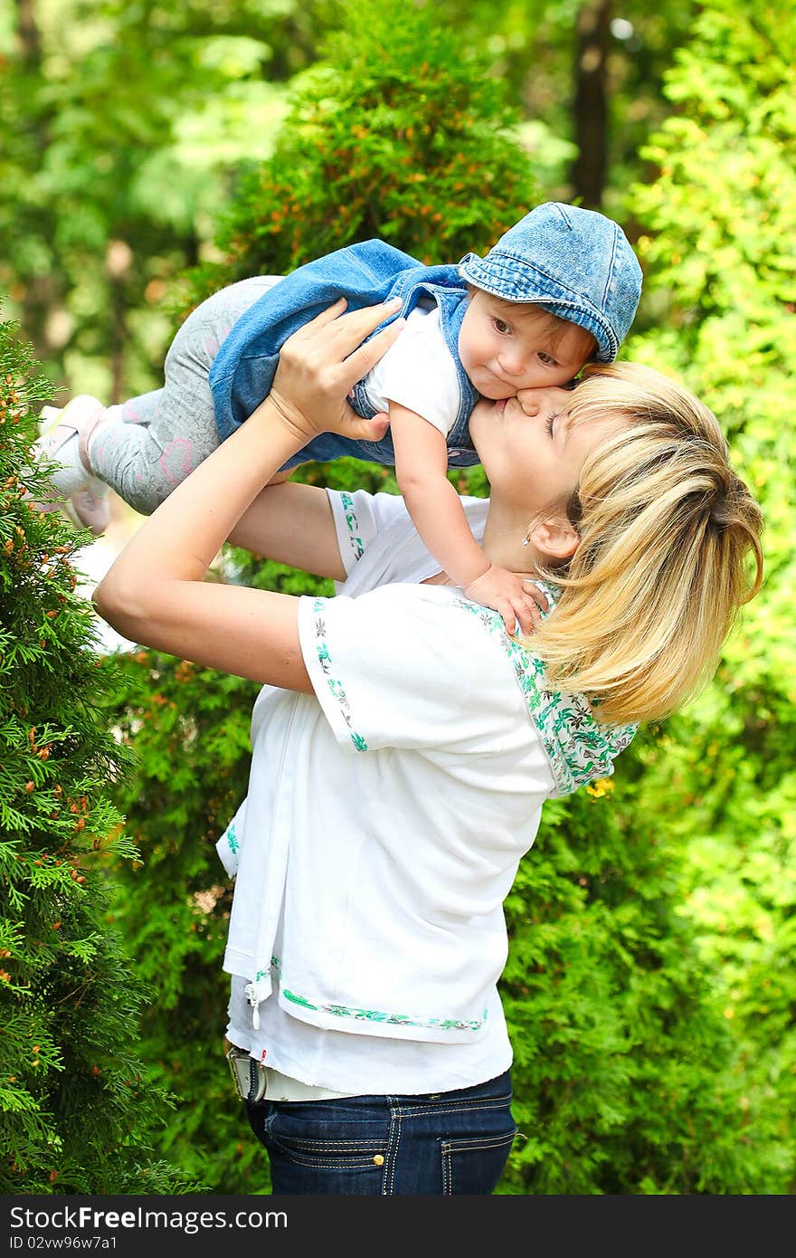 Mothers and son in park. Mothers and son in park