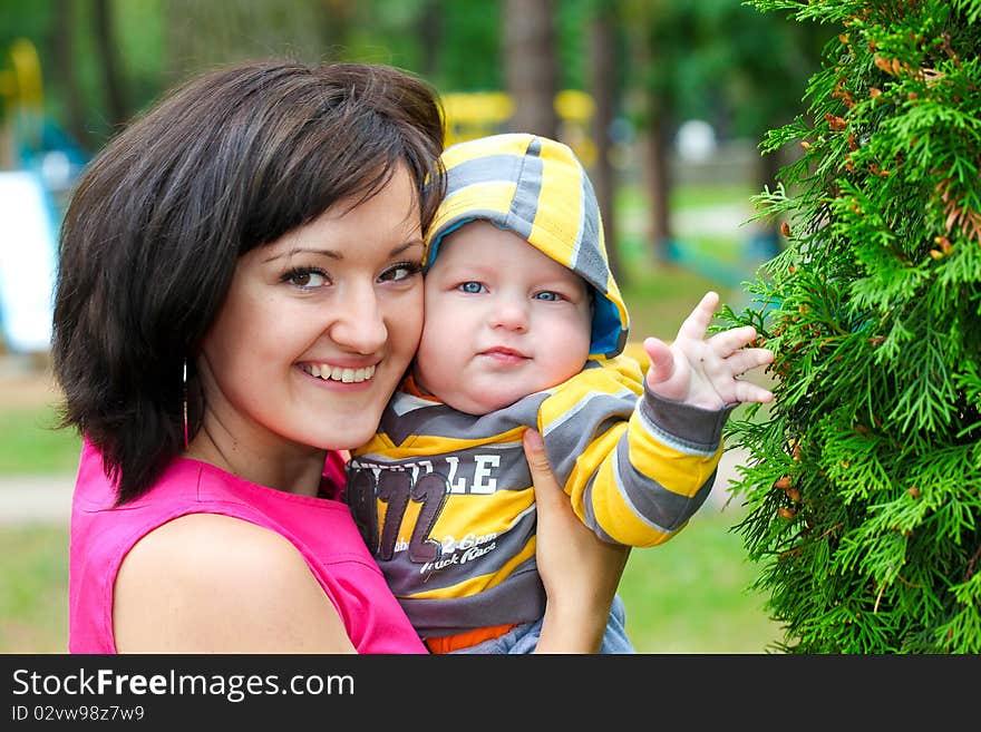 Mothers and son in park. Mothers and son in park