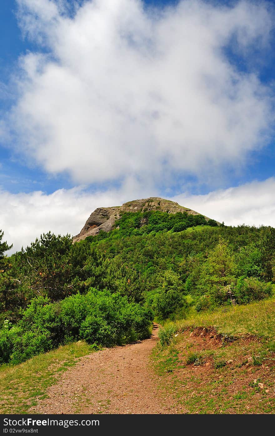 View of the mountain in a fog day, path of the pioneer