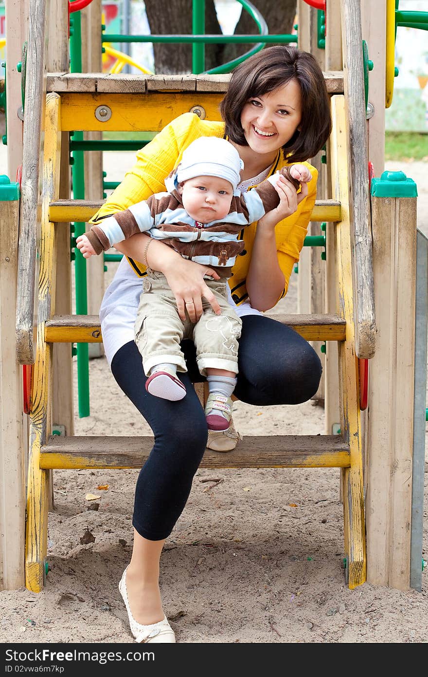 Mothers and son in park. Mothers and son in park