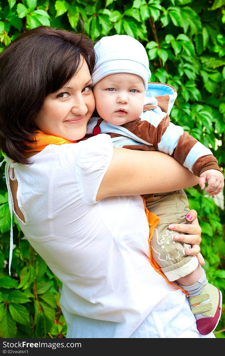 Mothers and son in park. Mothers and son in park