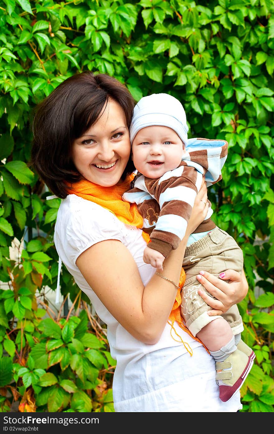 Mothers and son in park. Mothers and son in park