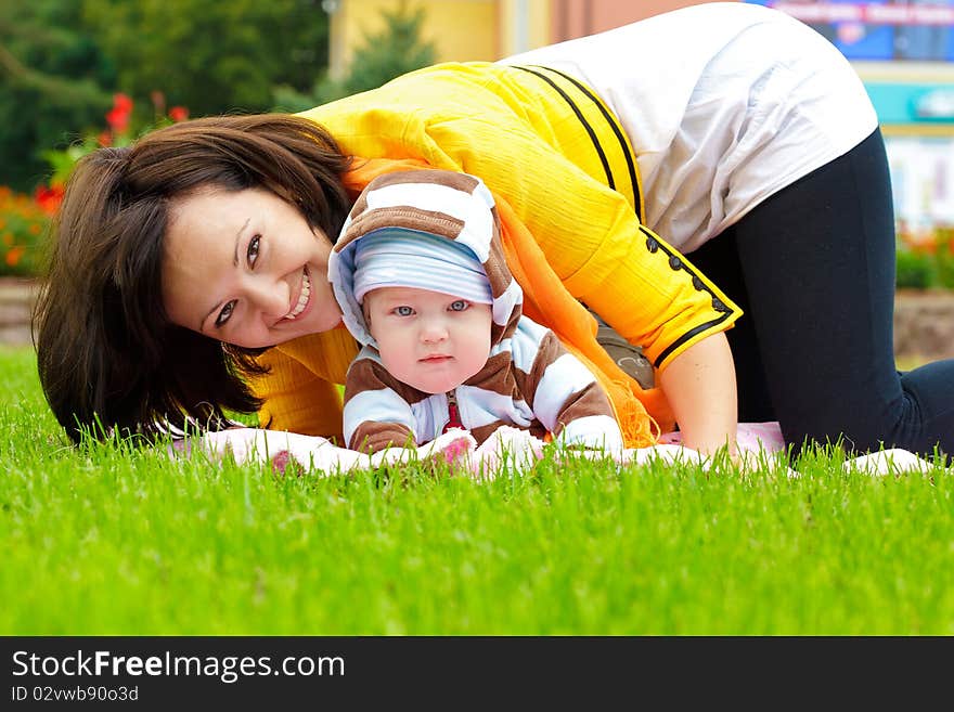 Mothers and son in park. Mothers and son in park