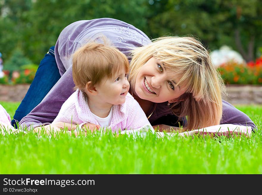 Mothers and son in park. Mothers and son in park