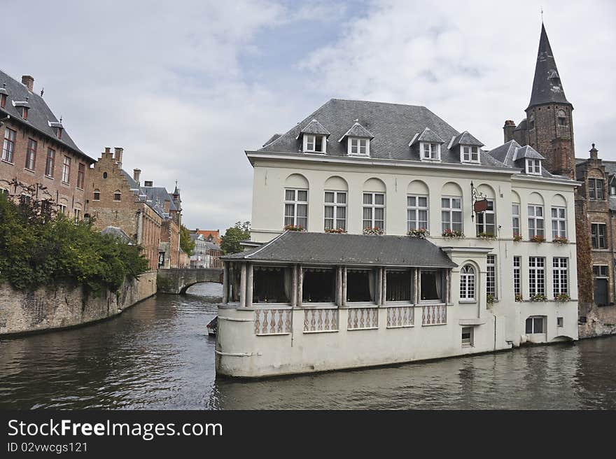 The old houses in the Flemish town of Bruges in Belgium . The old houses in the Flemish town of Bruges in Belgium