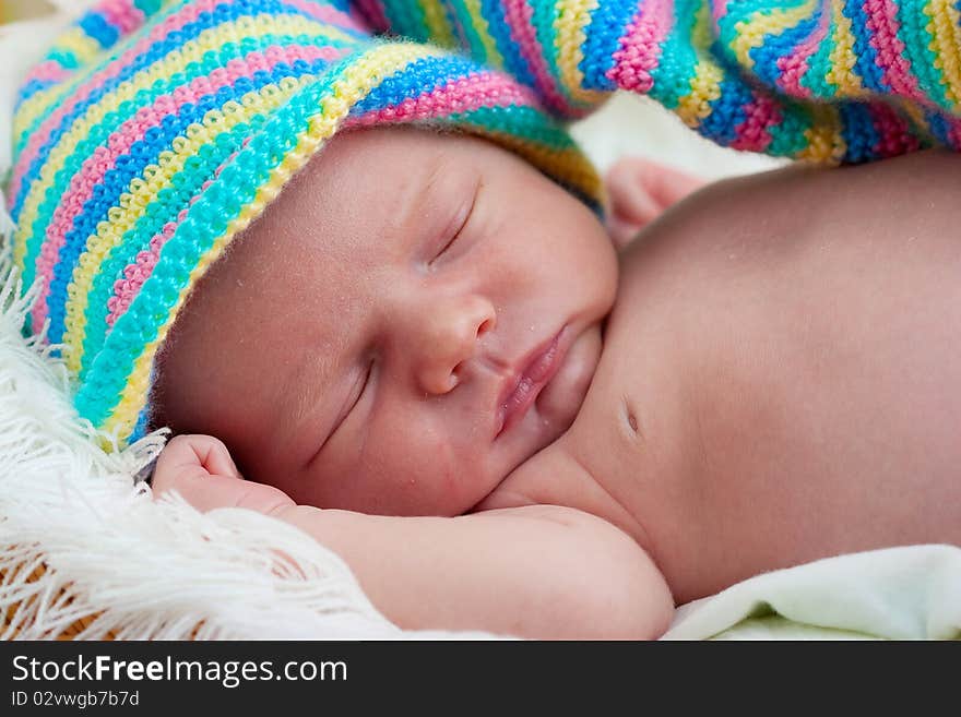 Baby sleeps on the towel