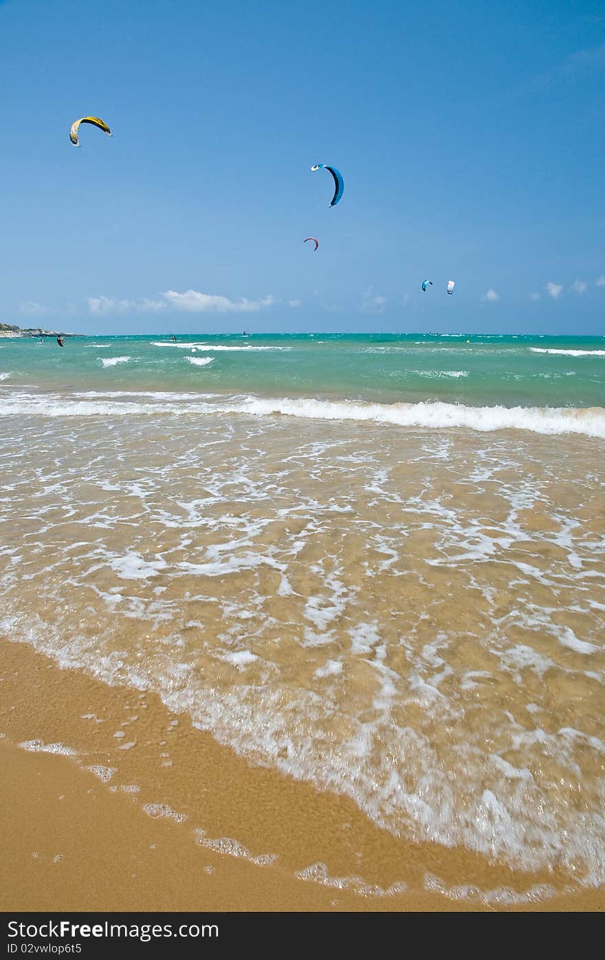 Kitesurfer kiteboarder in the sea by strong wind